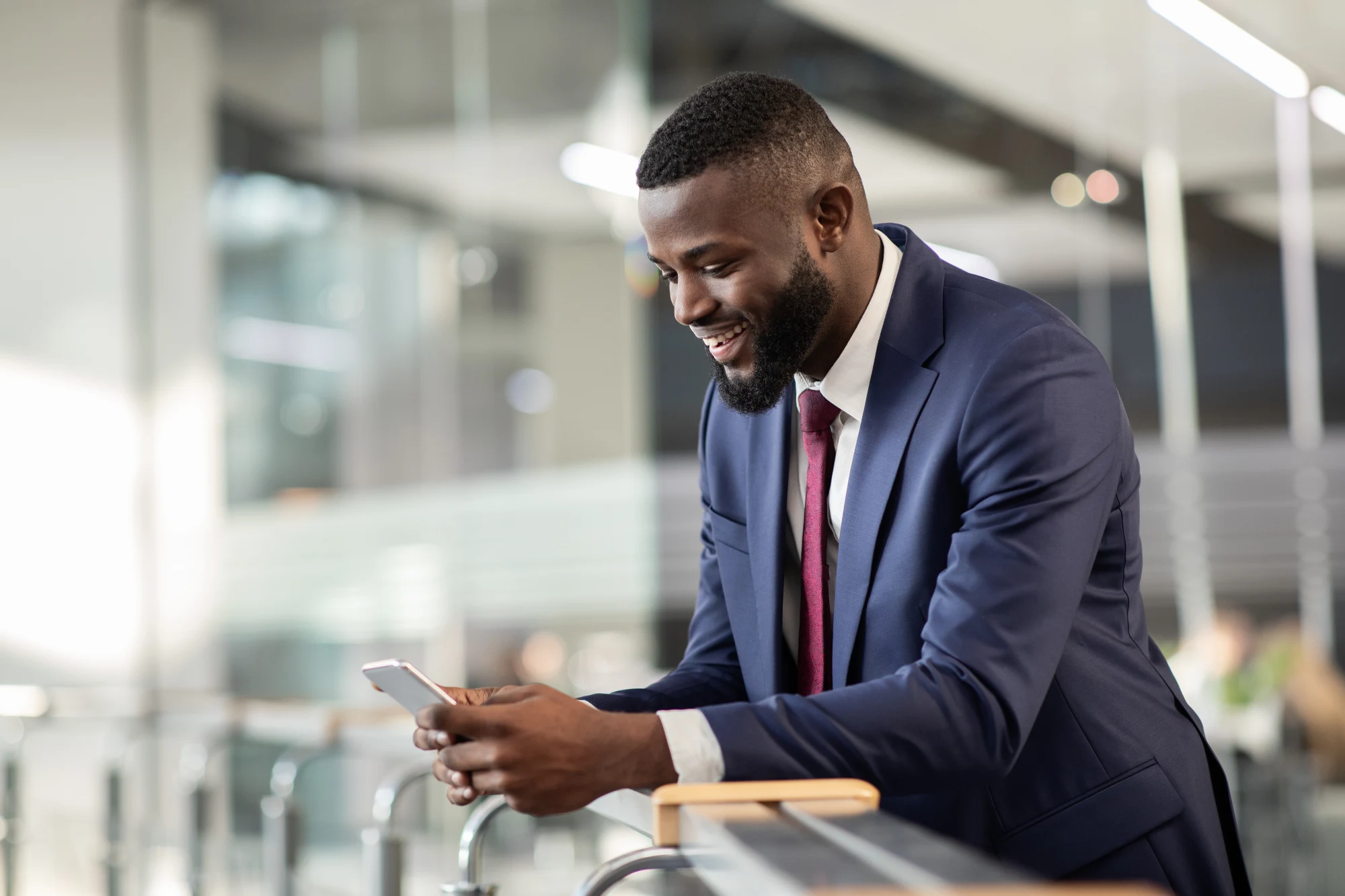 Black businessman using a smartphone